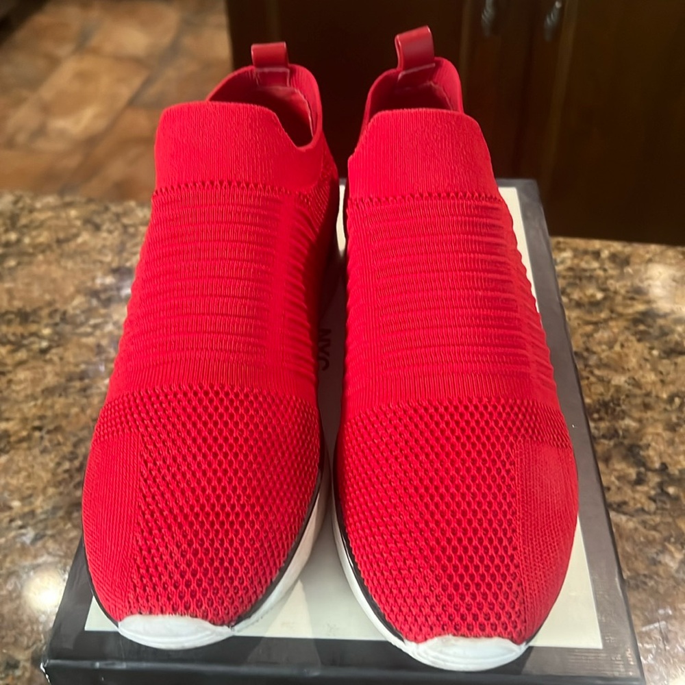 Red knit trainers by J Slides